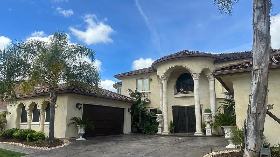 Color-matched gutters on a Mediterranean-style estate
